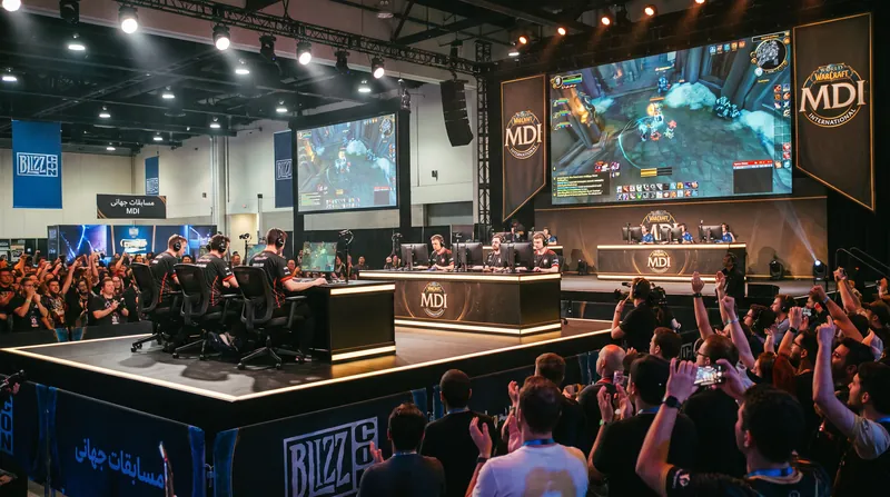 Five Team Liquid players competing on the BlizzCon 2026 main stage in front of monitors.