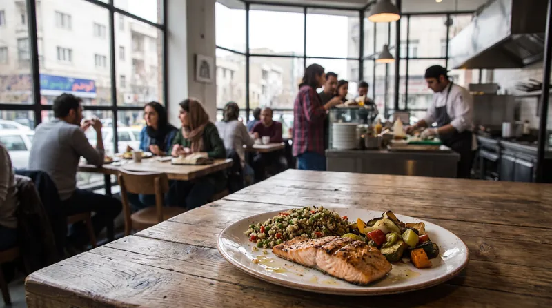 A top-down view of a healthy, protein-rich restaurant meal featuring grilled salmon and roasted vegetables.