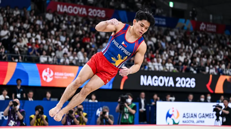 Carlos Yulo performs his gold-medal-winning floor exercise routine at the Nagoya General Gymnasium on Thursday.